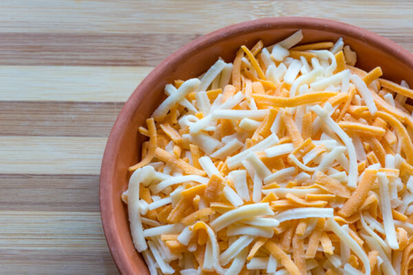 Mac & Yikes! Popular Shredded Cheese Brands Pulled From Shelves After FDA Warning