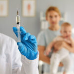 female-professional-nurse-doctor-with-flu-coronavirus-vaccine-1