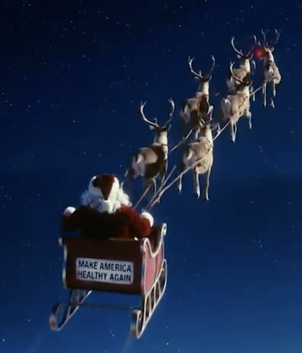 Santa Claus in a sleigh pulled by reindeer against a starry night sky, promoting a healthy America message.