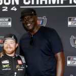 Yikes! Social Media Debates Appropriateness Of Viral Interaction Between Michael Jordan And Tyler Reddick’s Young Son (VIDEO) Michael-Jordan-Viral-Interaction-Tyler-Reddick-Son-Beau-Social-Media-Reactions-e1771338692363