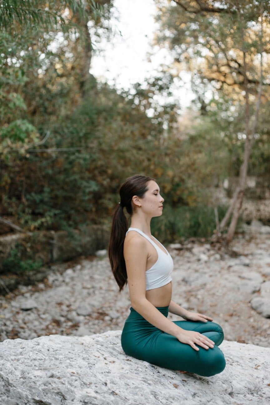 woman doing yoga outside