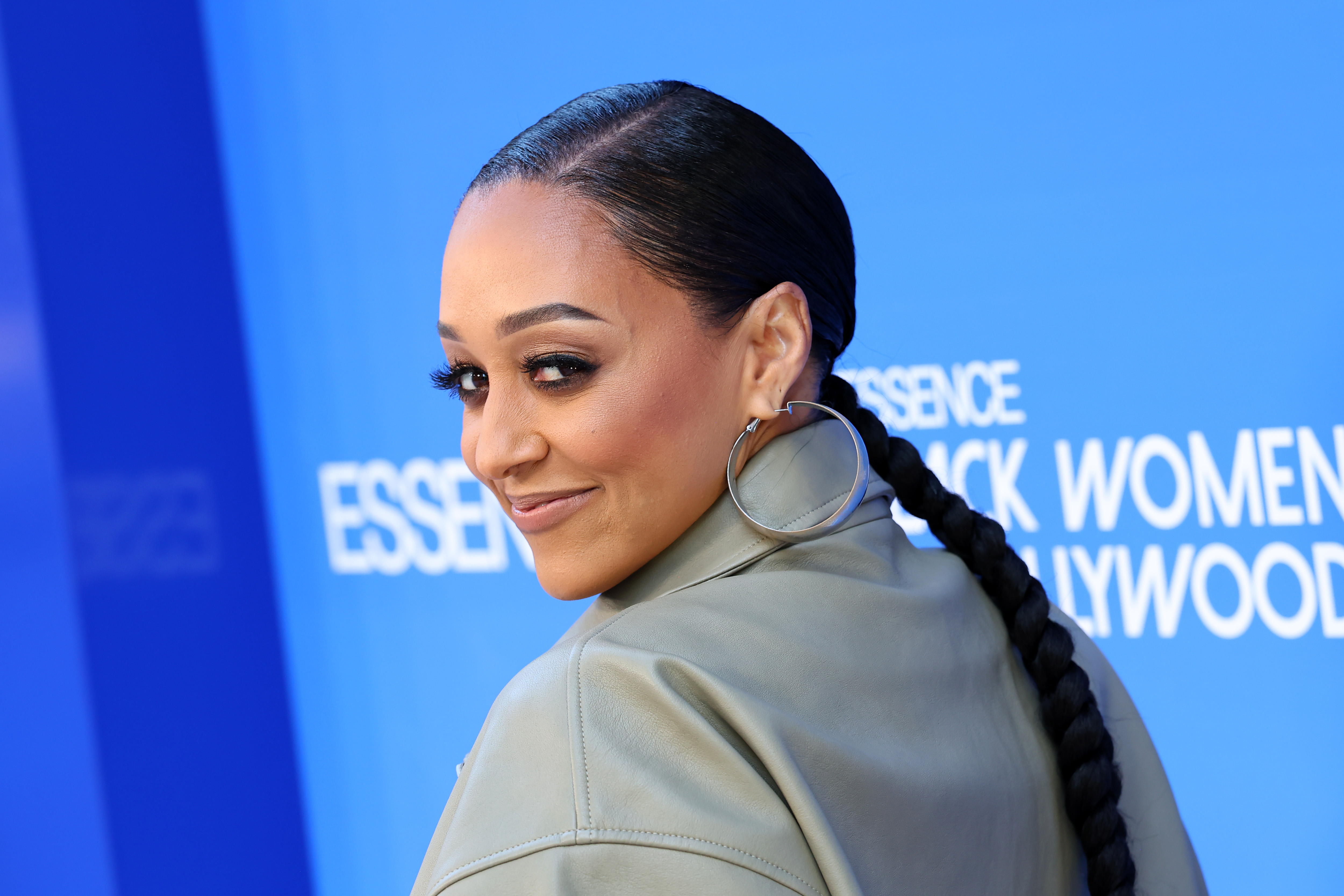 Soft Girl Era? Tia Mowry Teases Photos With Mystery Person After Revealing She’s In Love