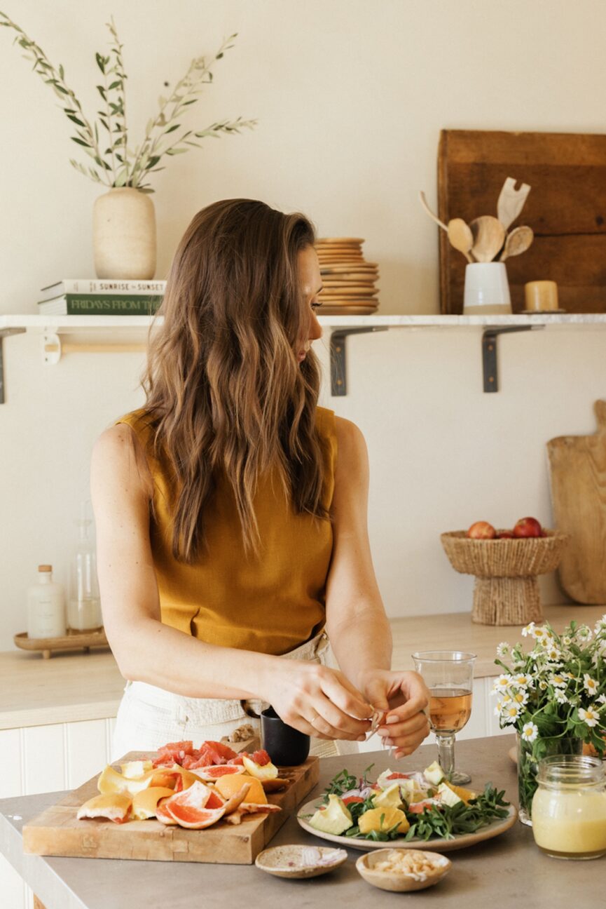 Camille Styles cooking with spring fruits and vegetables.