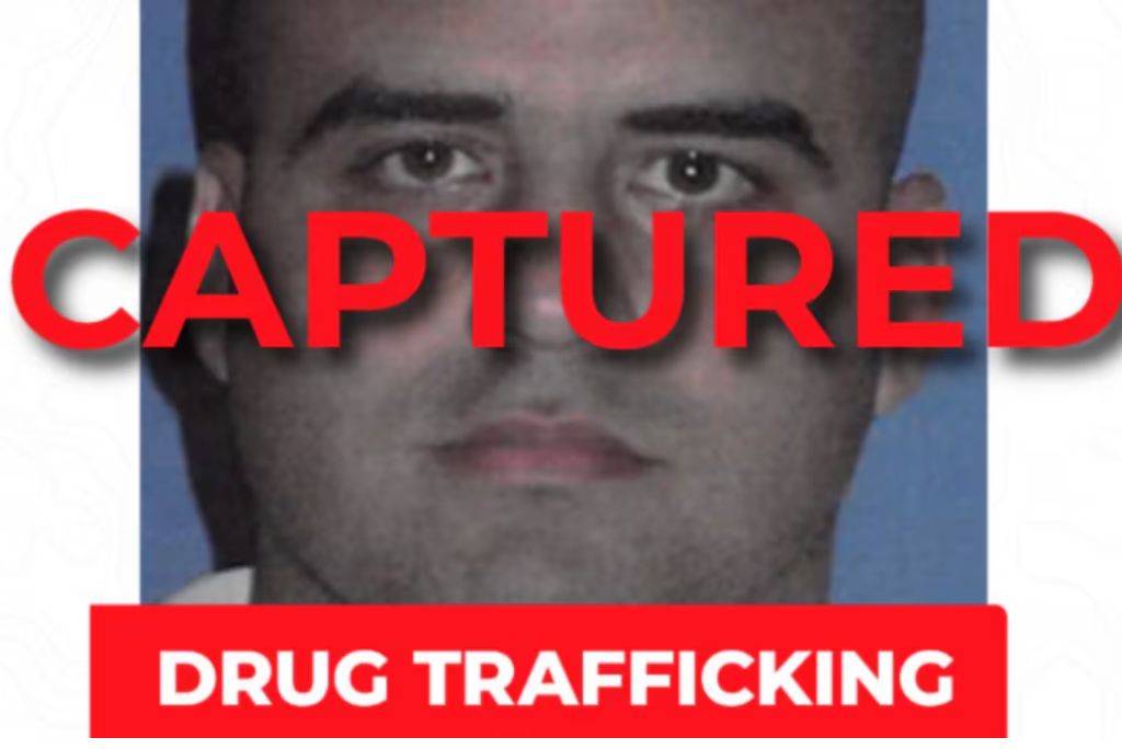 Image of a suspect in a drug trafficking case, marked "Captured," highlighting law enforcement success in combating illegal drug activities.