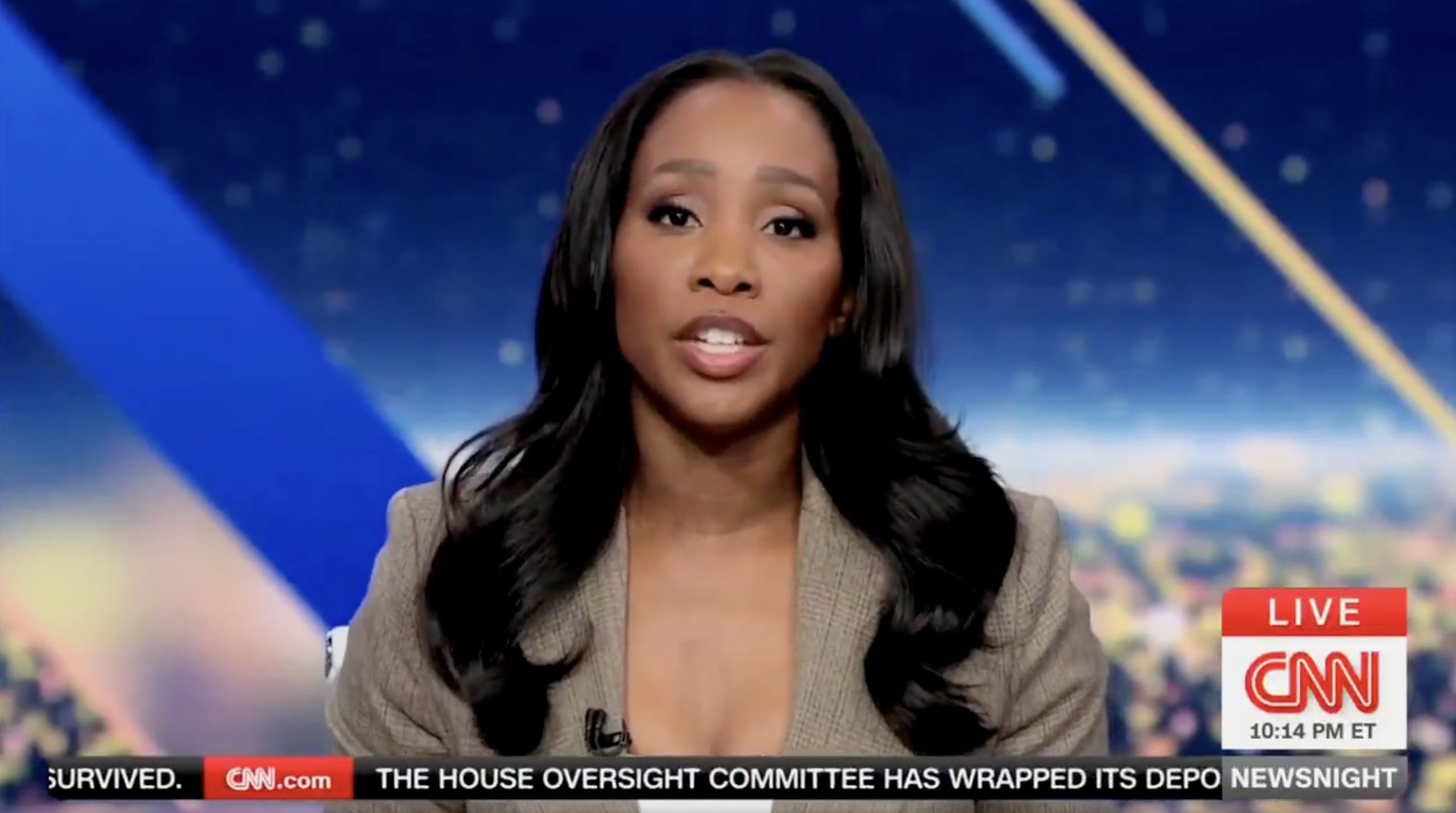 CNN news anchor delivering live coverage with a professional backdrop, highlighting current events and news updates.