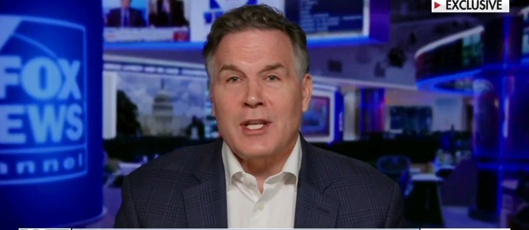 News anchor discussing current events in the Fox News studio, featuring a modern broadcast setup with multiple screens in the background.