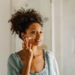 woman-putting-on-cream-300x200-1