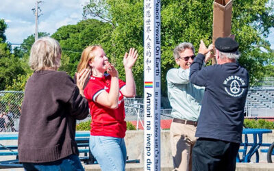 Planting a Peace Pole at Analy, Sebastopol, California, USA.