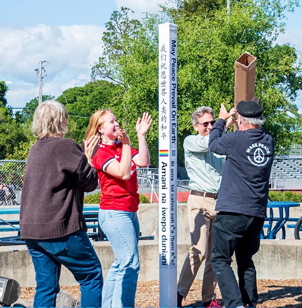 Planting a Peace Pole at Analy, Sebastopol, California, USA.
