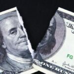 Is the Dollar Collapsing? 8 Key Indicators You Can’t Ignore broken-money-shutterstock_1468046462