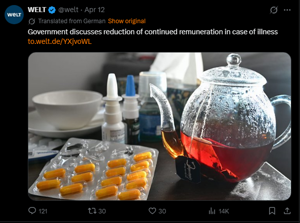 Tea kettle with red tea, medication capsules, and various health products on a table, illustrating discussions on government health policies.