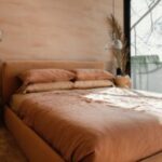 9 Designer Tricks That Instantly Make a Bedroom Feel Bigger monochromatic-bedroom-300x200-1
