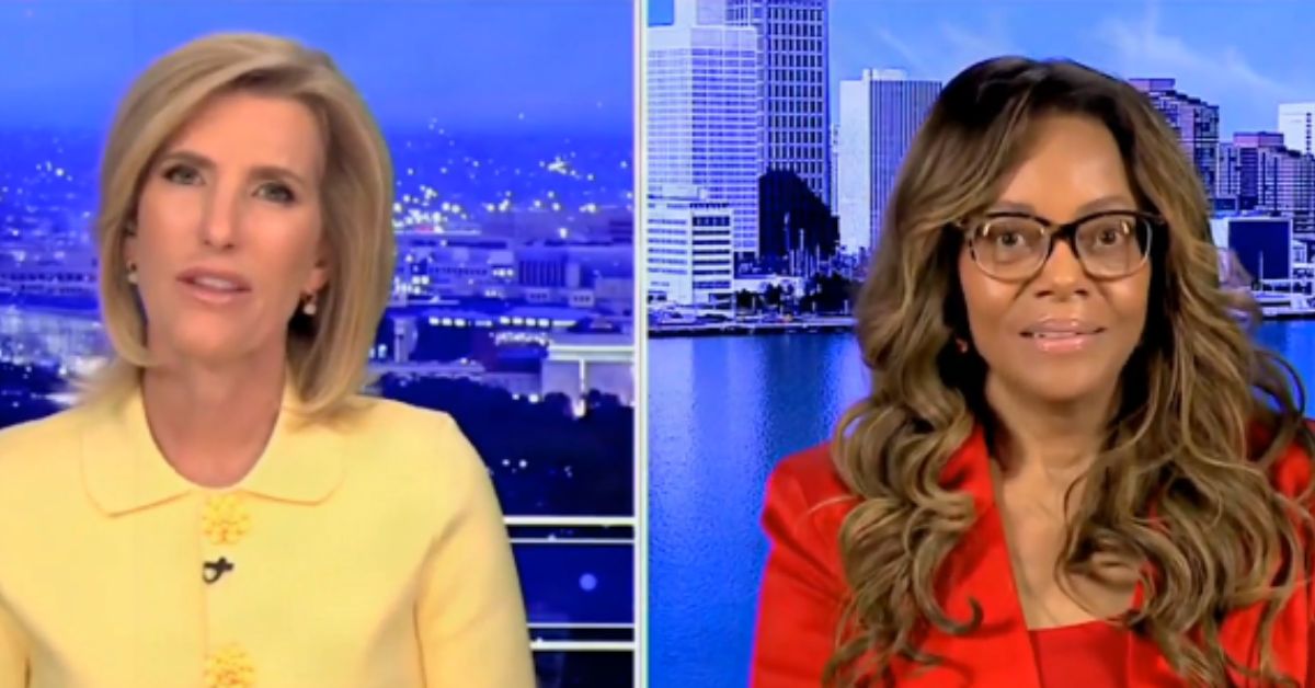 Two women engage in conversation on a news program, with a city skyline in the background, highlighting a professional and informative discussion.