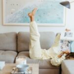 woman-reading-magazine-on-couch-300x200-1