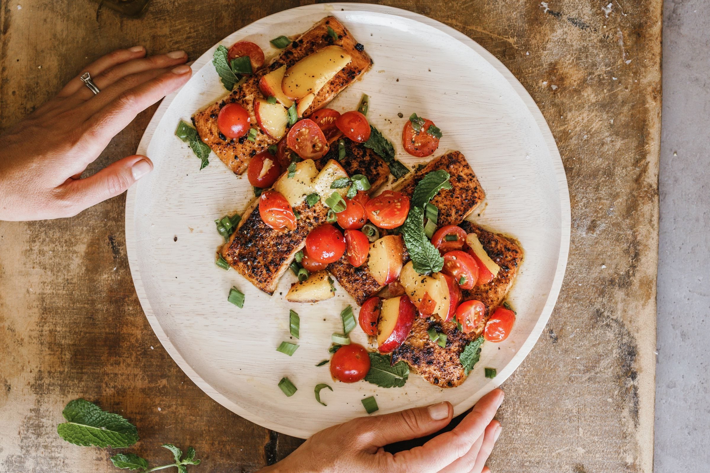 grilled plank salmon on white plate