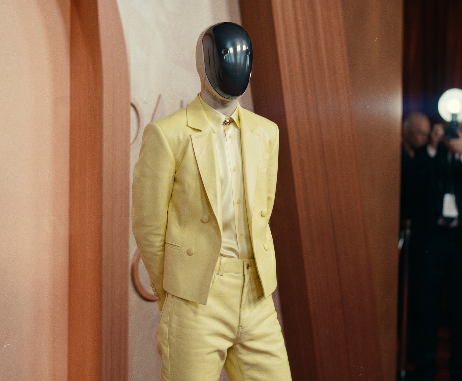 Humanoid robot wearing a tailored uniform