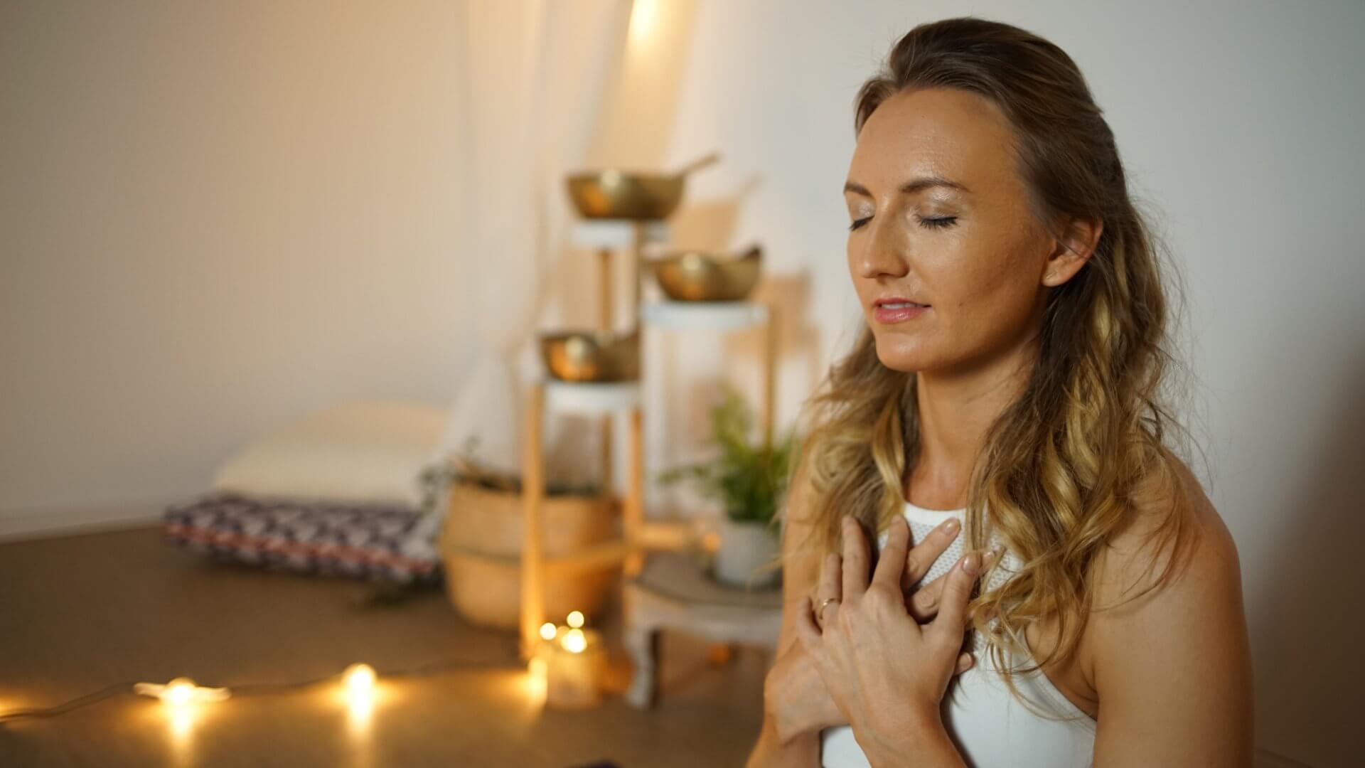 Woman chanting mantras for healing