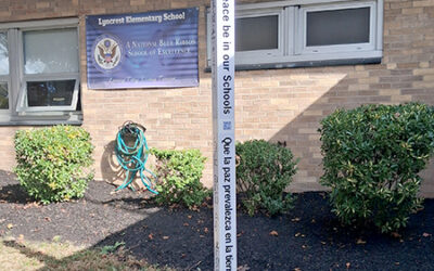 Peace Pole at Lyncrest School, Fair Lawn, New Jersey, USA.