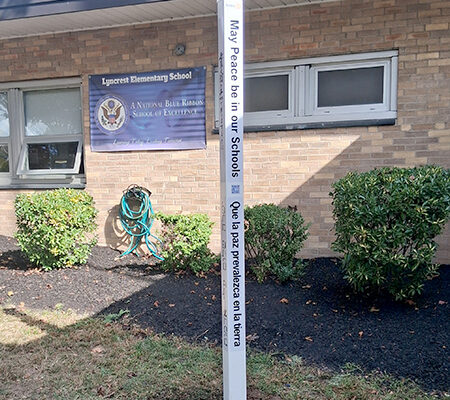 Peace Pole at Lyncrest School, Fair Lawn, New Jersey, USA.