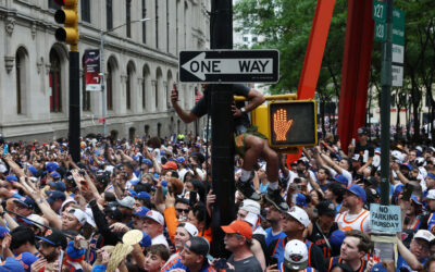 A 24-Year-Old EMT Climbed onto a Subway Entrance and Used Narcan to Revive an Unconscious Man at the Knicks Parade
