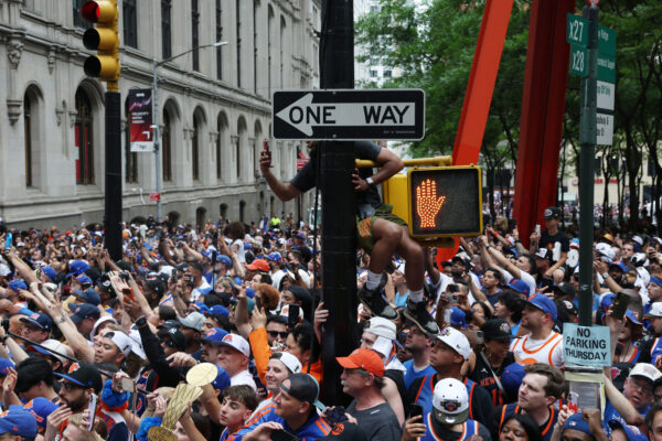 A 24-Year-Old EMT Climbed onto a Subway Entrance and Used Narcan to Revive an Unconscious Man at the Knicks Parade