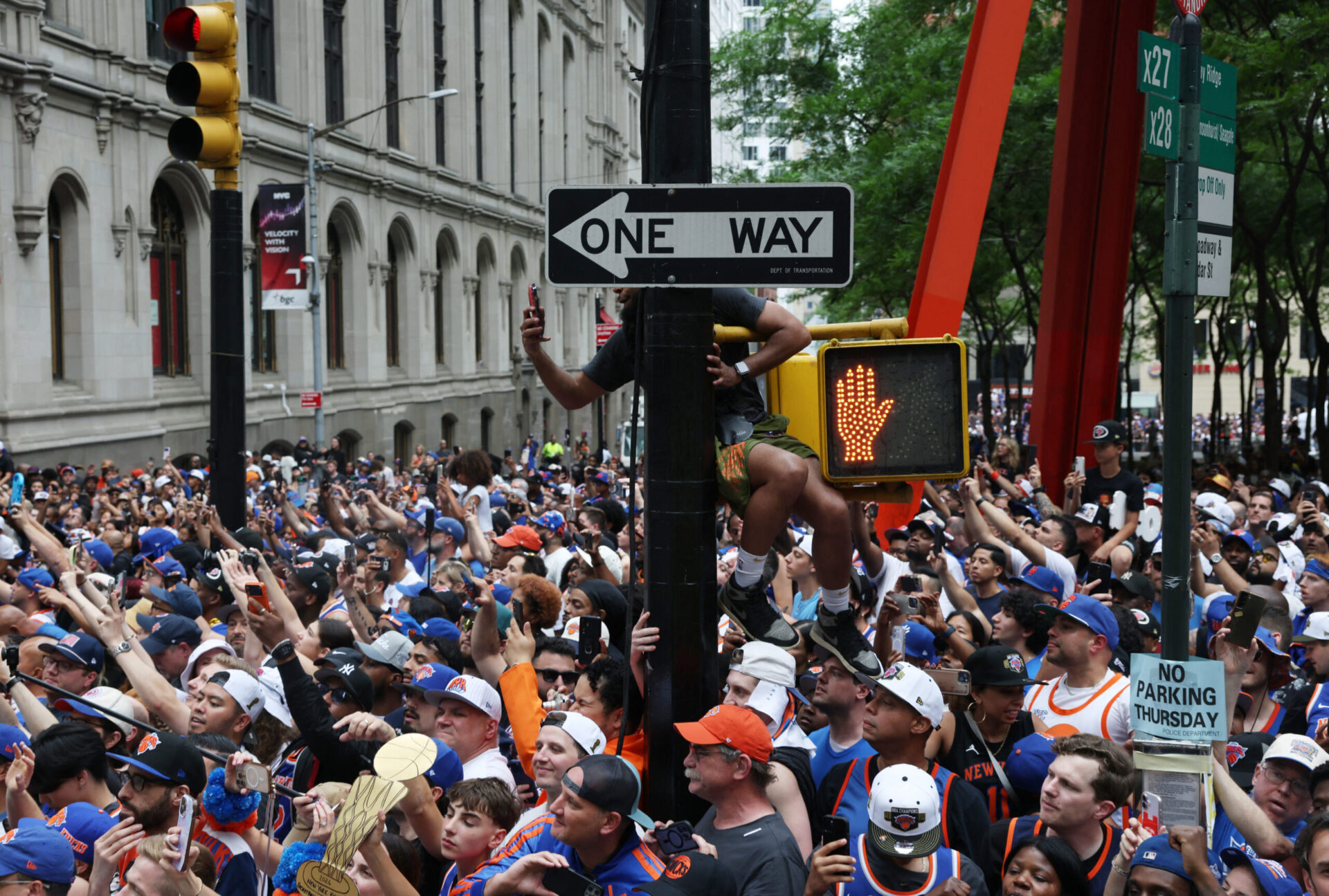 A 24-Year-Old EMT Climbed onto a Subway Entrance and Used Narcan to Revive an Unconscious Man at the Knicks Parade
