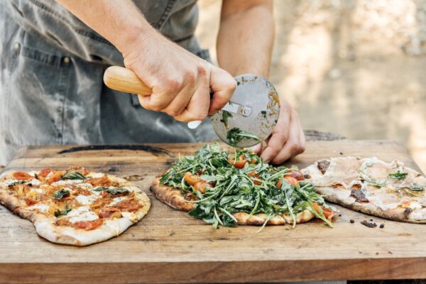 Hosting a Pizza Party Will Be The Most Fun You Have All Summer—Here’s Exactly How to Do It