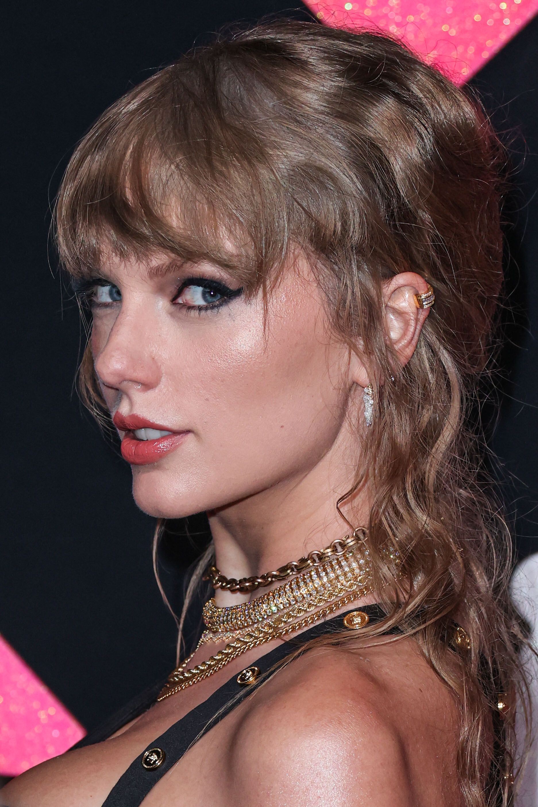 Taylor Swift wearing a Versace dress at the 2023 MTV Video Music Awards at the Prudential Center in Newark, New Jersey