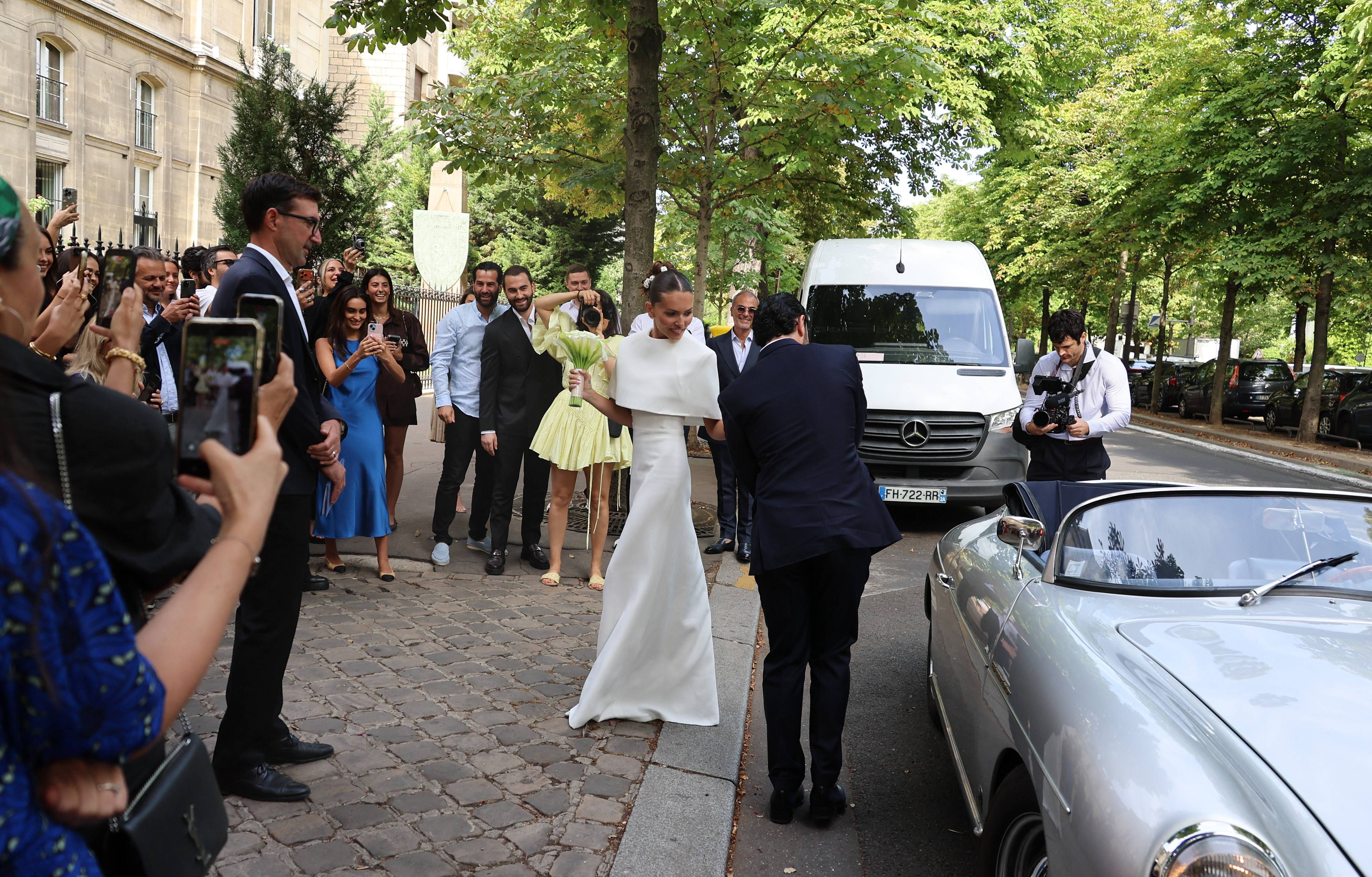 Thylane Blondeau and Benjamin Attal posing together on their wedding day in Paris