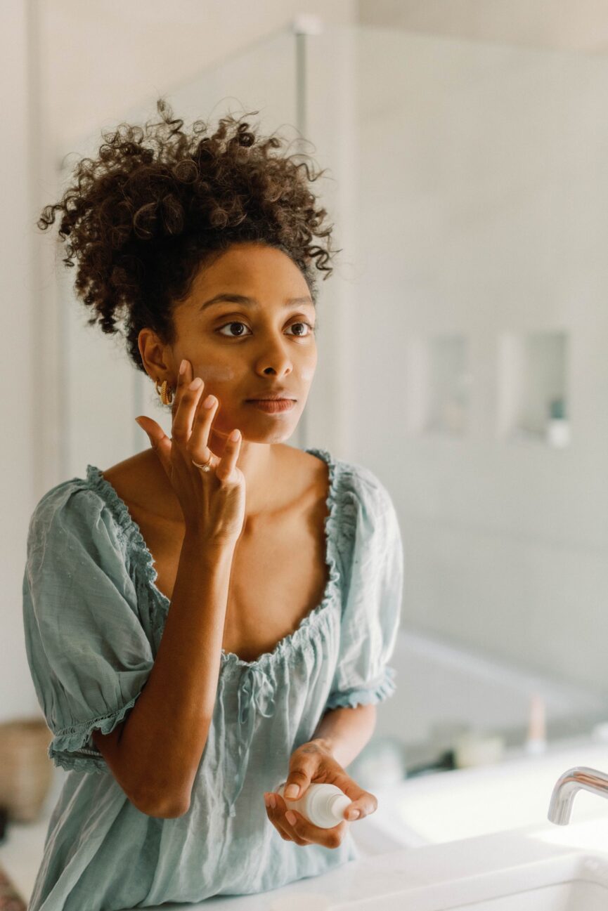 Woman applying the best eye cream