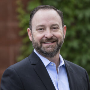 A headshot of Ben Allen