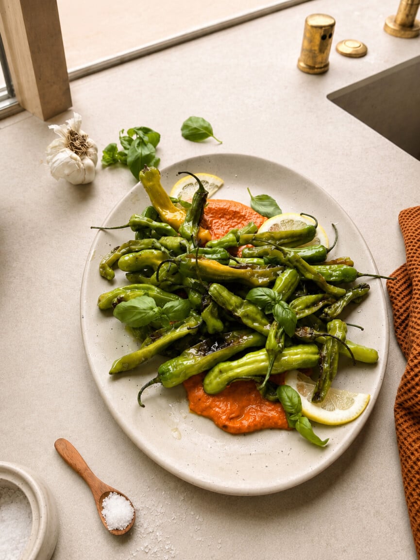 Charred Shishitos with Romesco, Lemon & Herbs