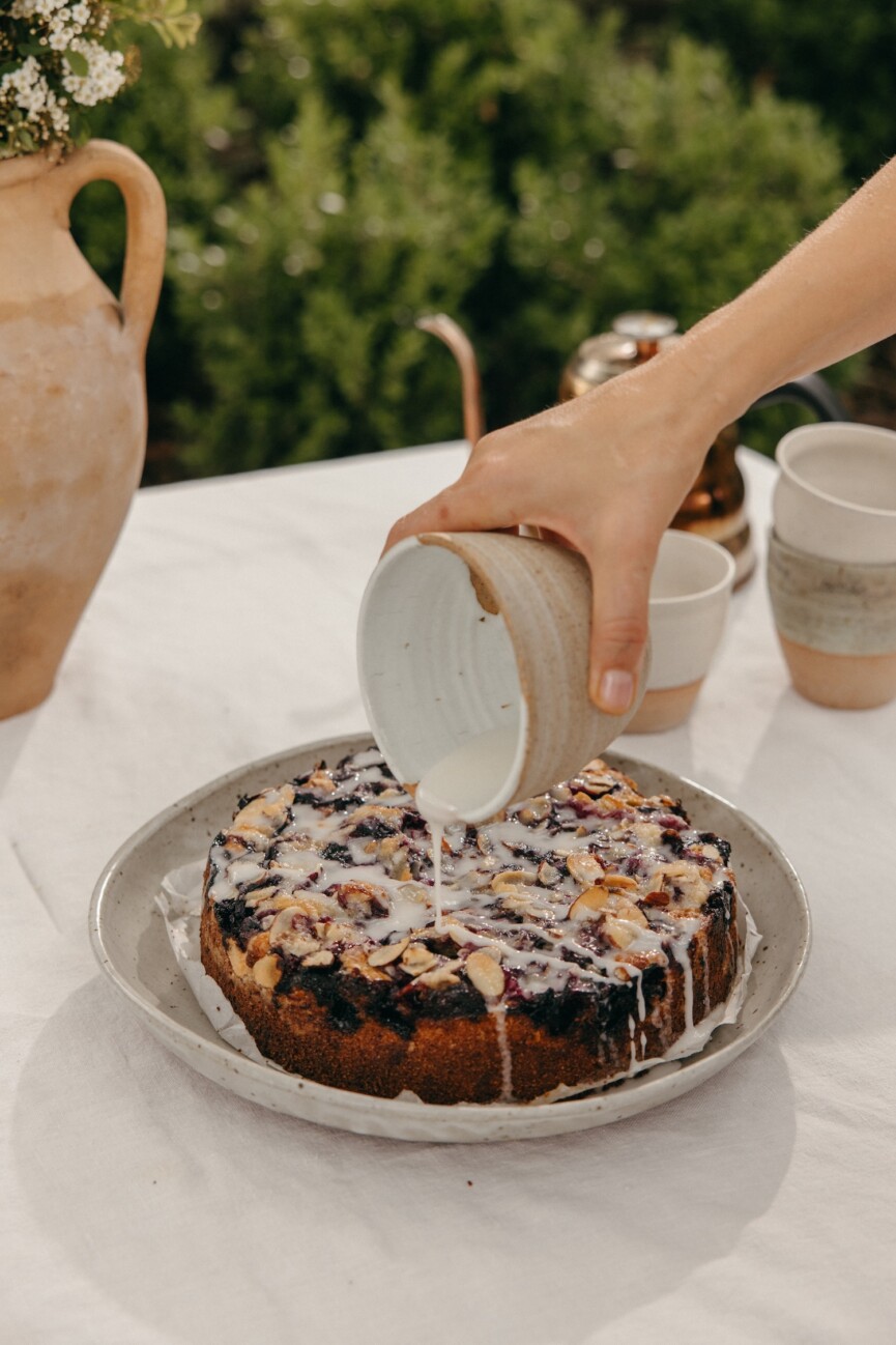 blueberry cornmeal cake with almond crumble and lemon glaze