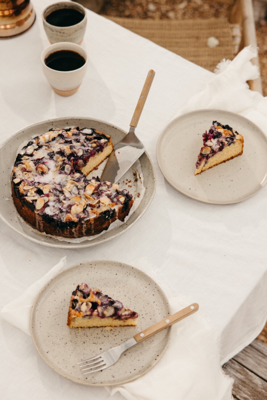 blueberry cornmeal cake with almond crumble and lemon glaze