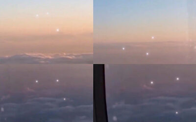 Crew member films three bright orbs shadowing aircraft over Alaska