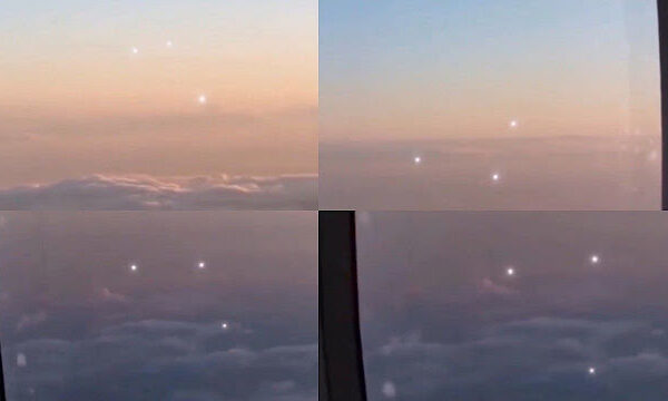 Crew member films three bright orbs shadowing aircraft over Alaska