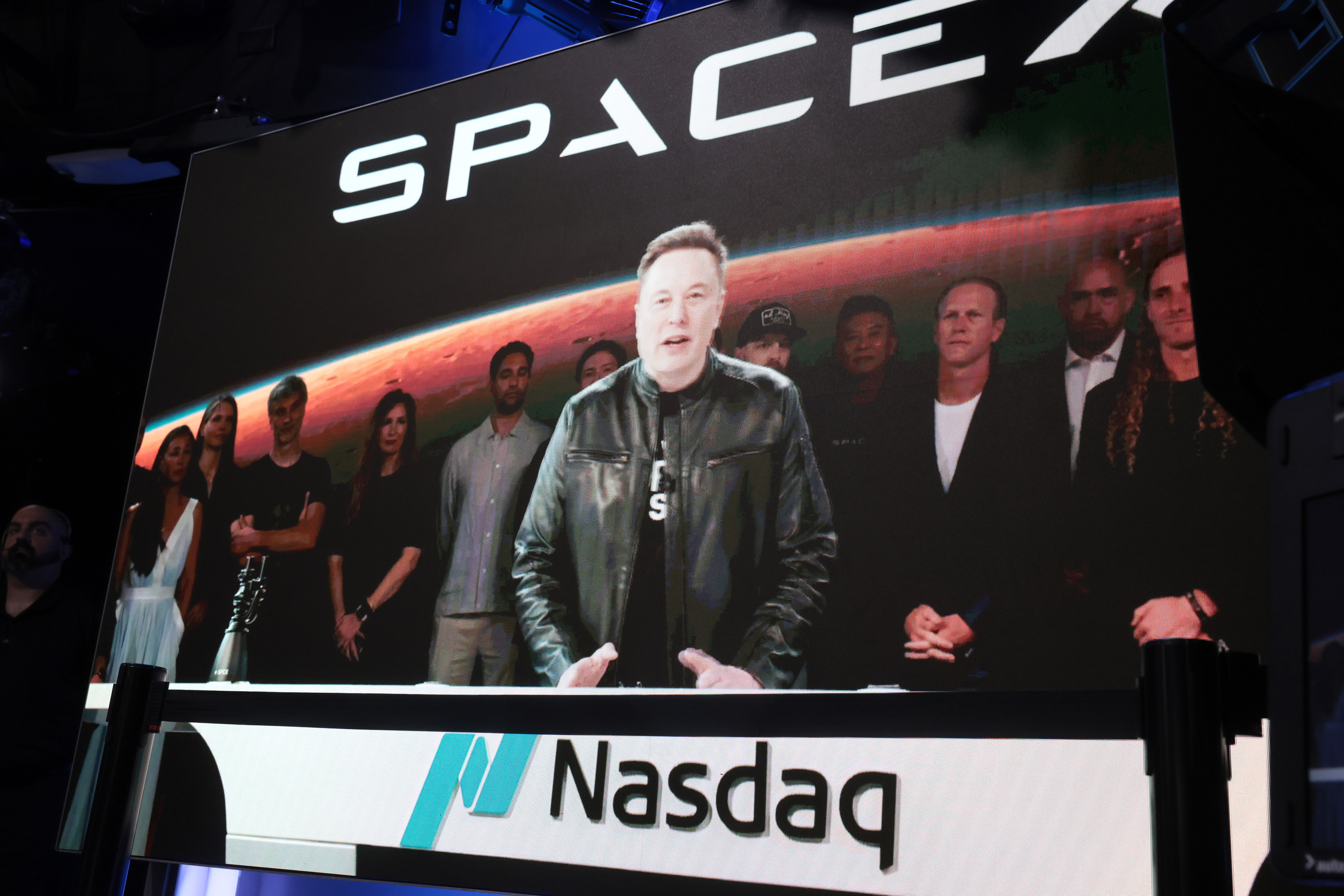 Elon Musk speaking via video screen at the Nasdaq Marketsite in Times Square during SpaceX's IPO launch