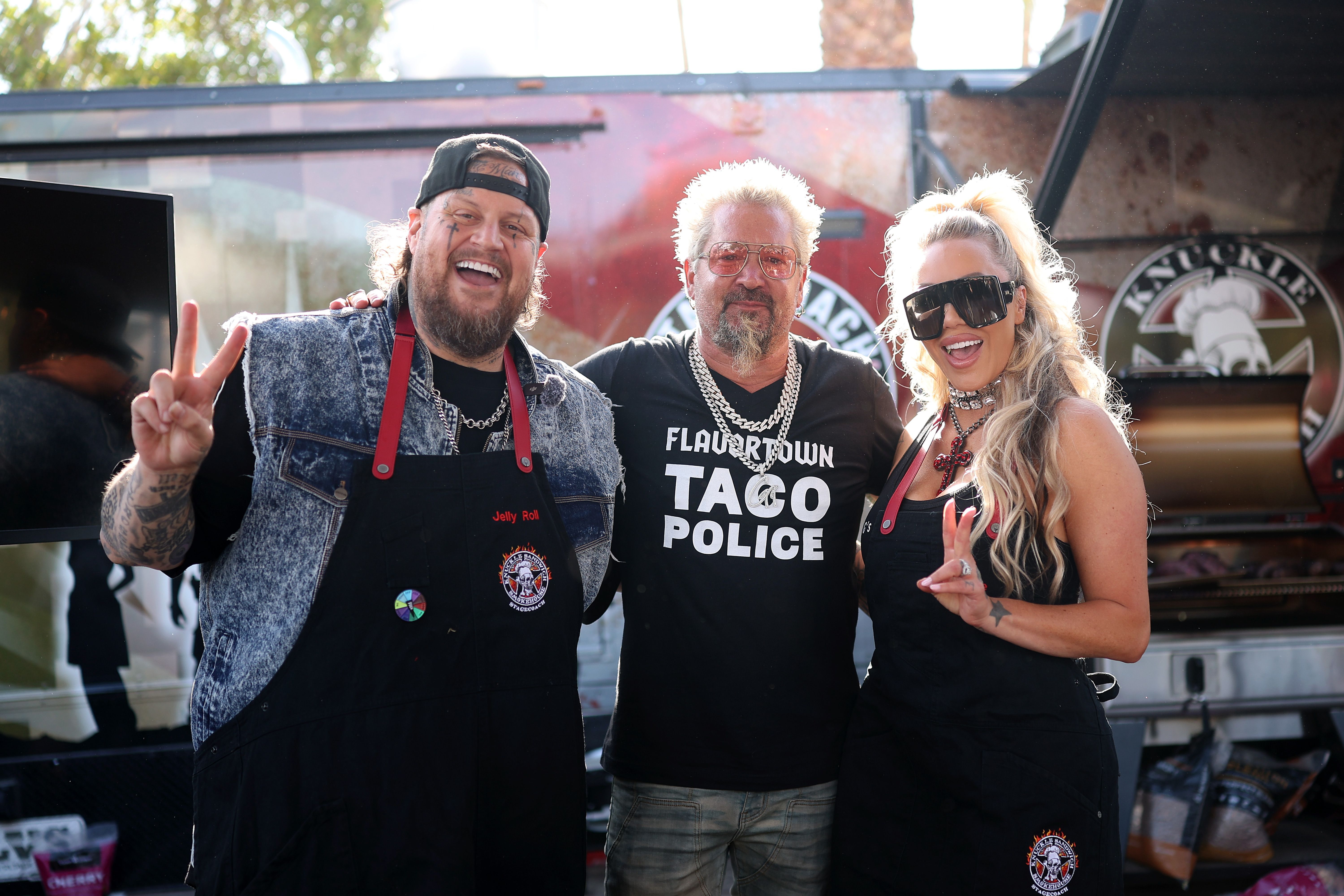 Jelly Roll, Guy Fieri, and Bunnie Xo together at Guy Fieri's Stagecoach Smokehouse at the 2025 Stagecoach Festival