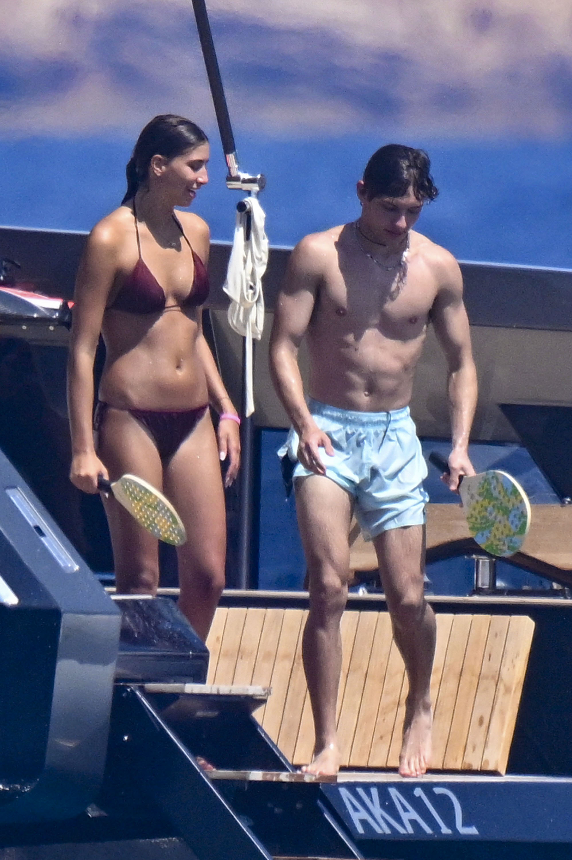 Kimi Antonelli on a yacht off the coast of Sardinia with his father Marco and a mystery brunette
