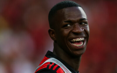 Vinícius Jr. Showed Off His Newly Defined Jawline at Reserva Beach Following the FIFA World Cup, Alongside His On-Again, Off-Again Girlfriend, Virginia Fonseca
