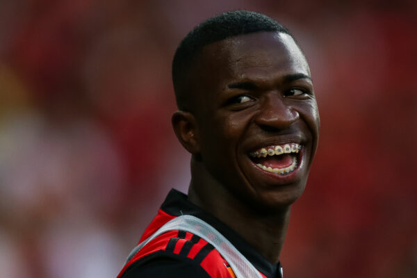 Vinícius Jr. Showed Off His Newly Defined Jawline at Reserva Beach Following the FIFA World Cup, Alongside His On-Again, Off-Again Girlfriend, Virginia Fonseca