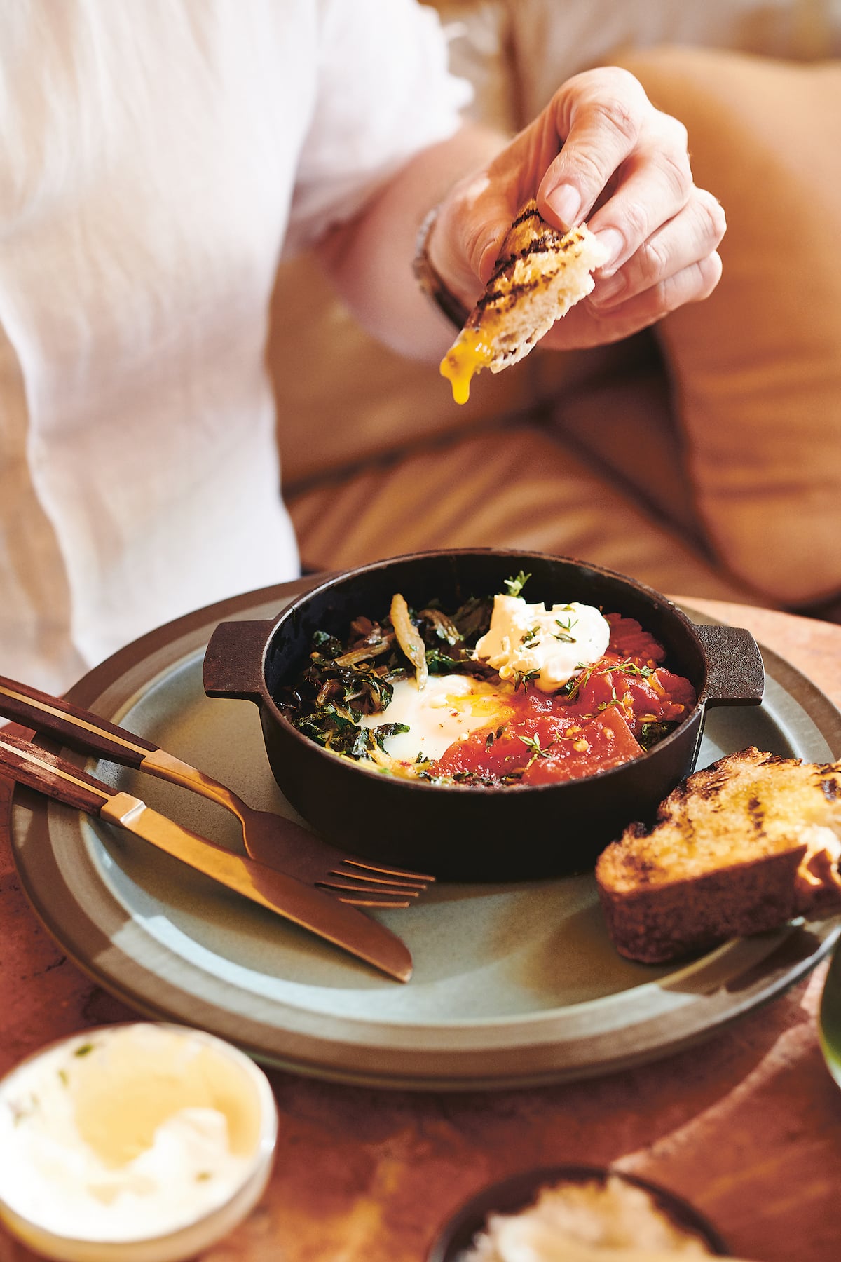 Baked green eggs with roast tomato and chilli salsa