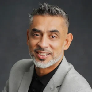 A headshot of Jack Uppal.