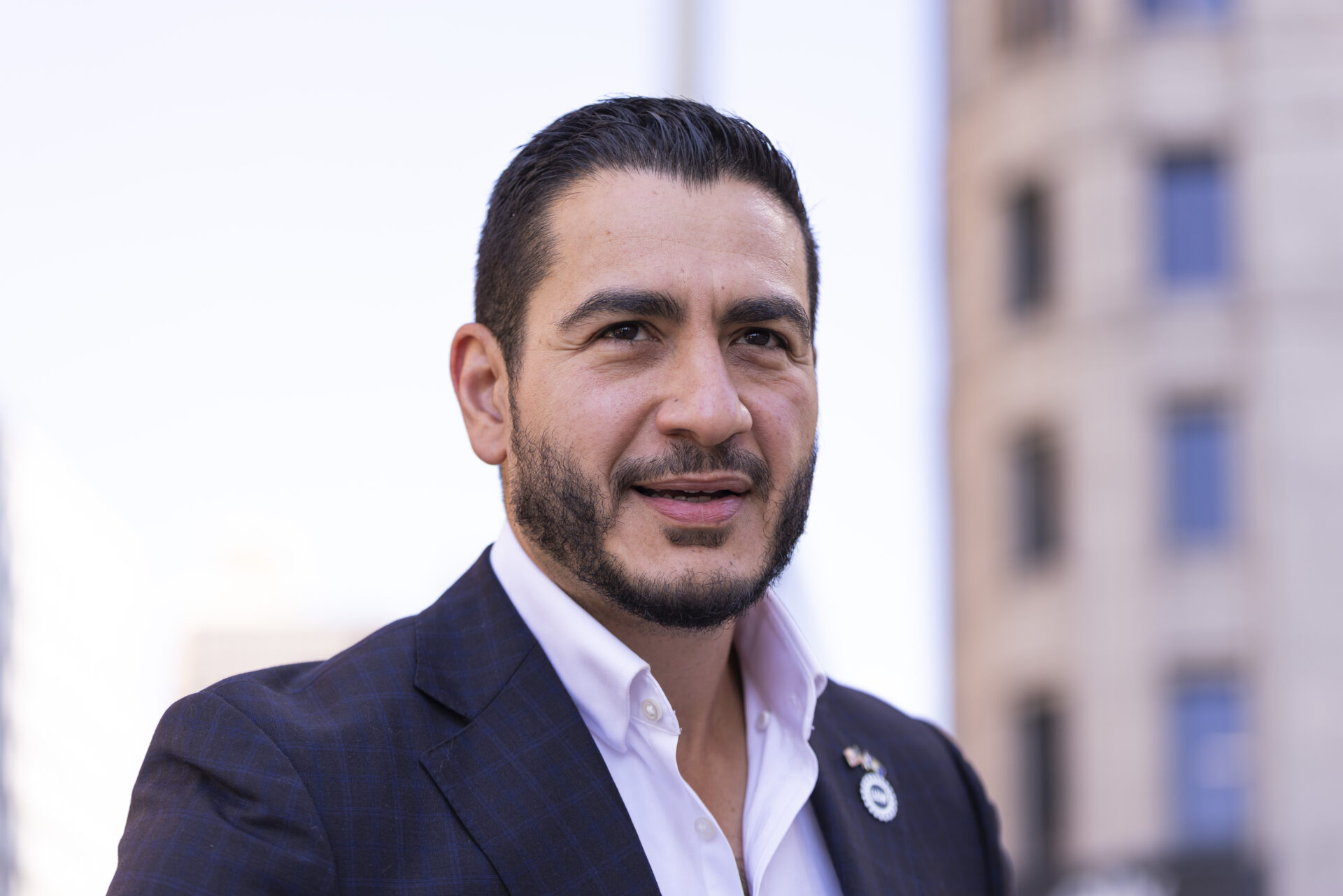 Abdul El-Sayed at a press conference in front of the Spirit of Detroit statue in Detroit, Michigan