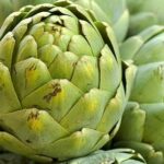 Artichokes: Nutrition, Benefits, & How To Cook And Eat Them artichoke-in-baskets-fresh-spring-vegetables-at-royalty-free-image-157315654-1547835108