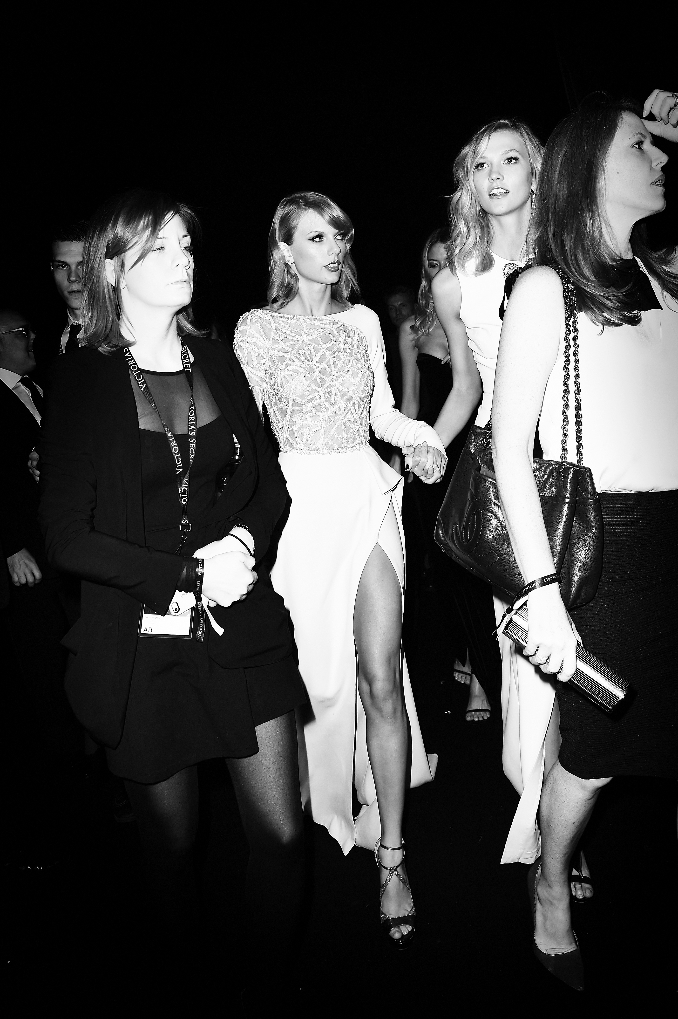 Taylor Swift and Karlie Kloss posing together backstage at the 2014 Victoria's Secret Fashion Show in London