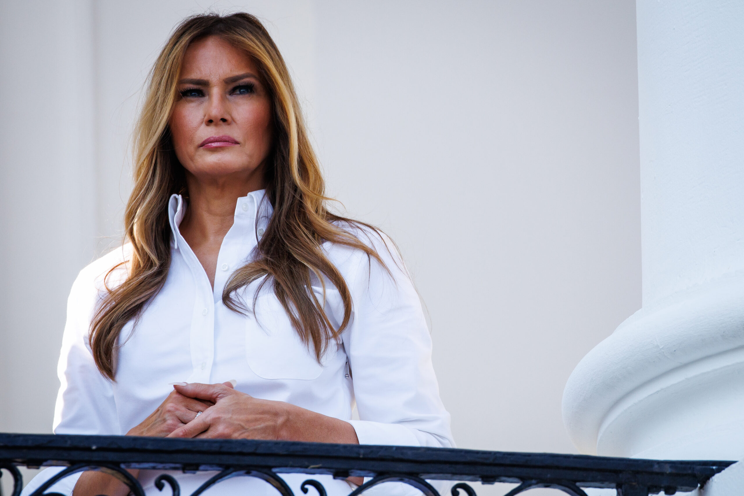 Melania Trump listening at an Independence Day military family picnic on the South Lawn of the White House