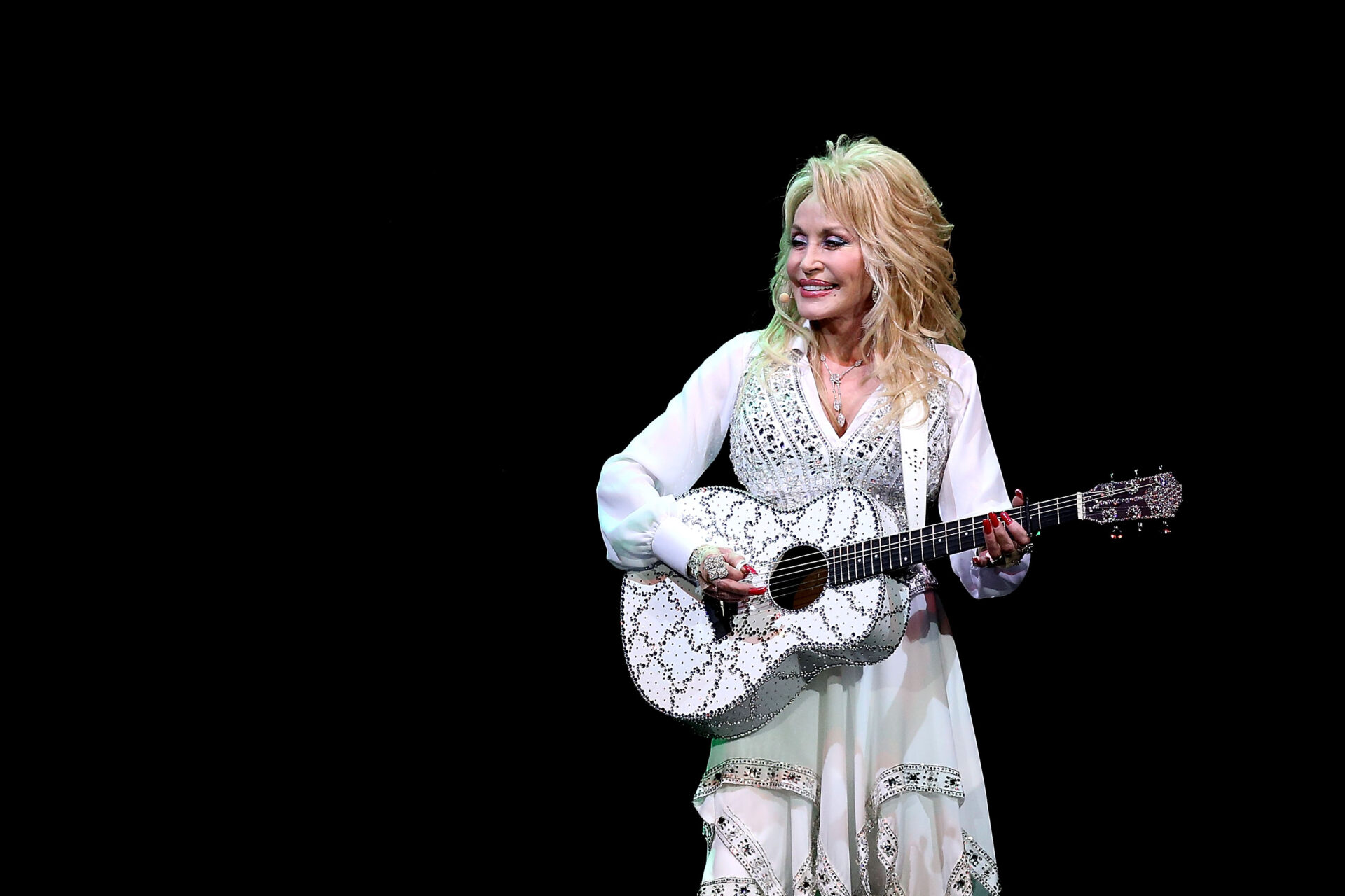 Dolly Parton performing on stage at Rod Laver Arena in Melbourne, Australia in 2014