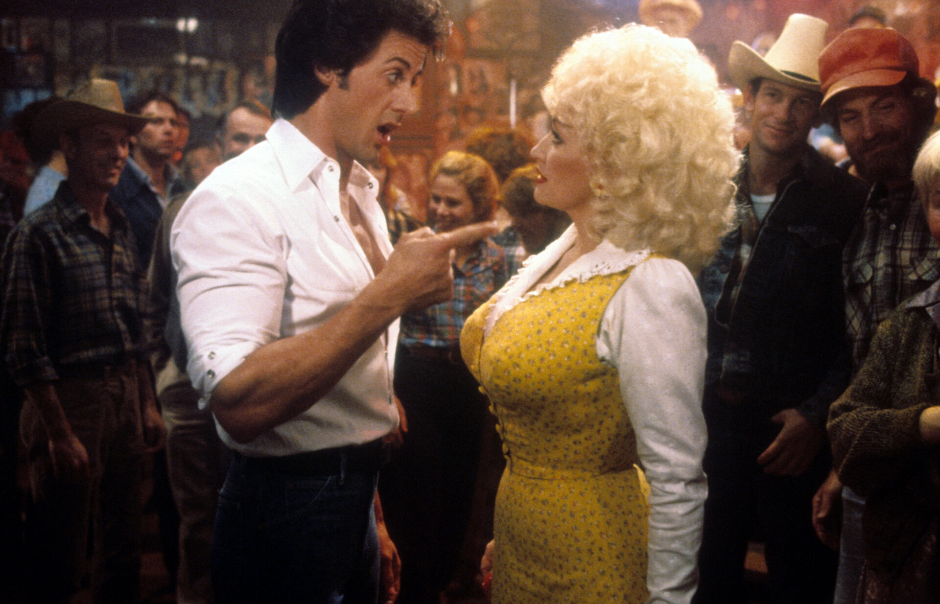 Dolly Parton Says Making the Flop ‘Rhinestone’ with Sylvester Stallone “Got Me Back On Track” During One of the Darkest Periods of Her Life
