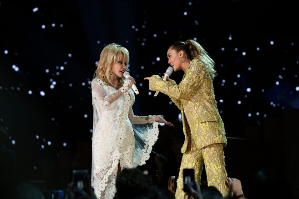 Dolly Parton Was Miley Cyrus’ Godmother, A Genealogy Search Showed They’re Actually Distant Cousins